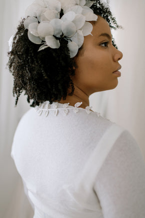 Wedding Shrug made from sustainable 100% Cashmere. Hand crochet silk vines adorn the neckline.  Detail back view